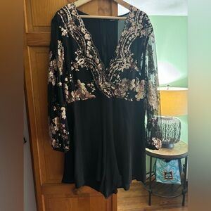 Black and gold romper. New without tags